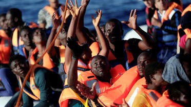 Migrants are seen before they embark on Migrant Offshore Aid Station (MOAS) rescue vessel Phoenix during a rescue operations in the international waters between Malta and Libya on August 10,2016. reuters