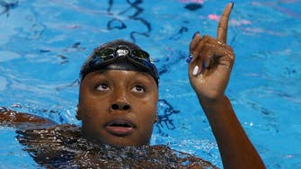 Manuel becomes first African American woman to win swim gold