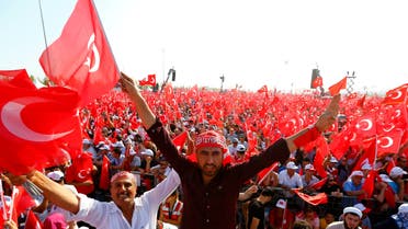 People wave Turkey's national flags during the Democracy and Martyrs Rally, organized by Turkish President Tayyip Erdogan and supported by ruling AK Party (AKP), oppositions Republican People's Party (CHP) and Nationalist Movement Party (MHP), to protest against last month's failed military coup attempt, in Istanbul, Turkey, August 7, 2016. REUTERS