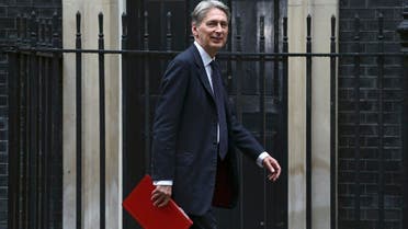 Britain's Chancellor of the Exchequer Philip Hammond arrives for a meeting of the "Cabinet Committee on Economy and Industrial Strategy" at Number 10 Downing Street in London, Britain August 2, 2016. REUTERS/Neil Hall/File Photo
