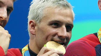 US swimmer Lochte says gun held to forehead in taxi hold-up