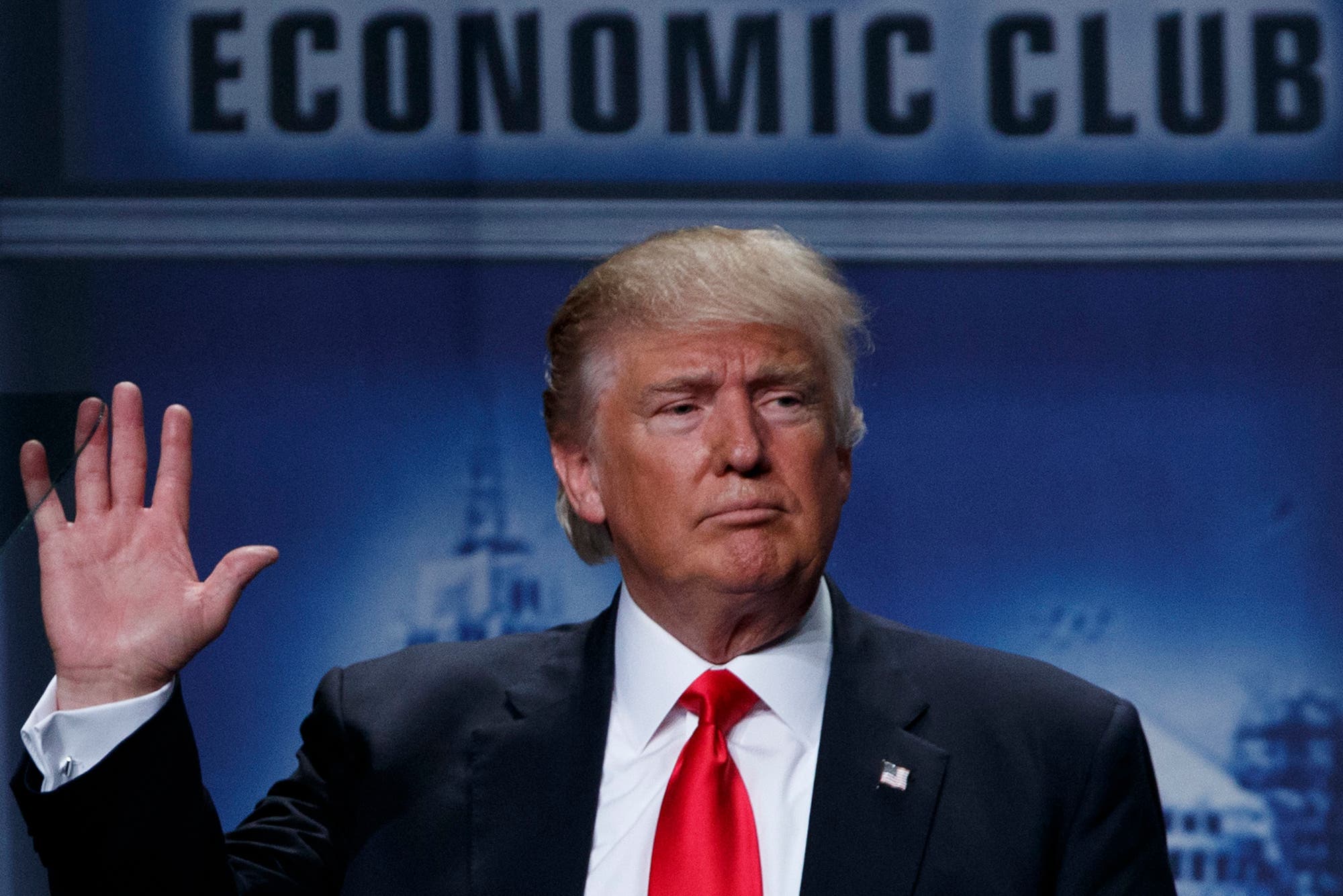 epublican presidential candidate Donald Trump waves after delivering an economic policy speech to the Detroit Economic Club, Monday, Aug. 8, 2016, in Detroit. (AP)