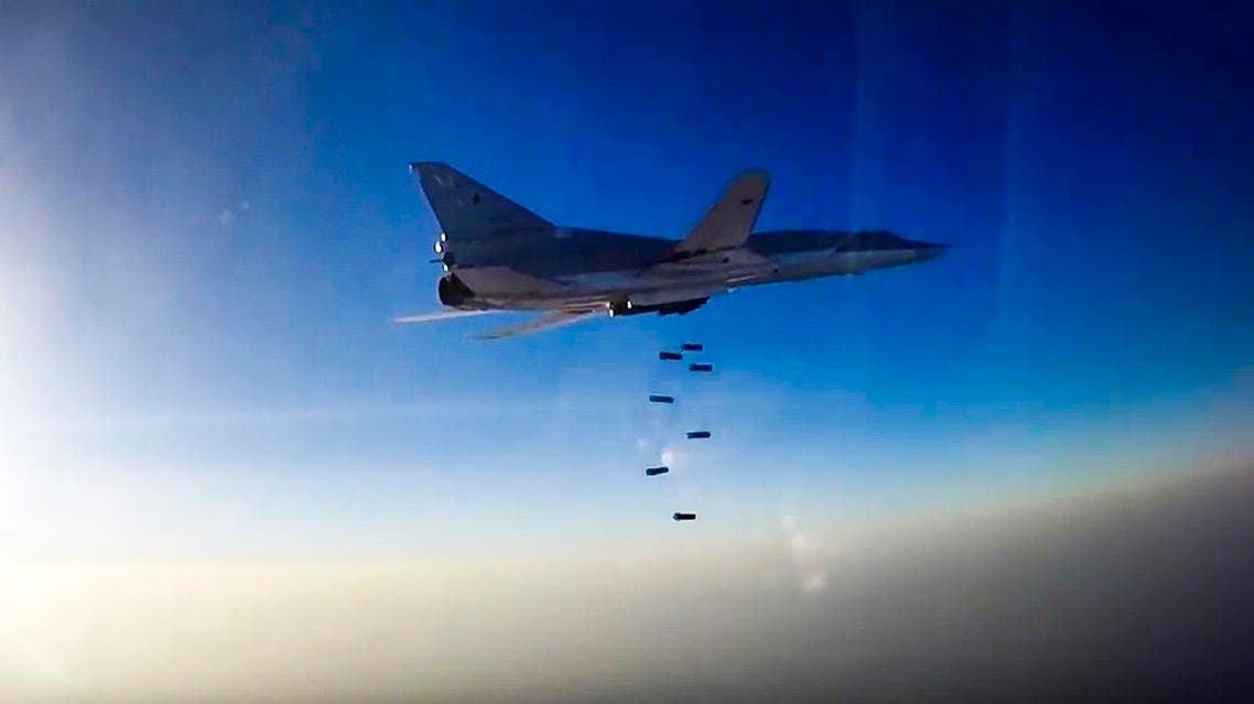 In this frame grab provided by Russian Defence Ministry press service, Russian long range bomber Tu-22M3 flies during an air strike over Aleppo region of Syria on Tuesday, Aug. 16, 2016. Russia's Defense Ministry said on Tuesday Russian warplanes have taken off from a base in Iran to target Islamic State fighters in Syria. (Russian Defence Ministry Press Service photo via AP)