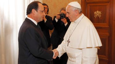 French President Francois Hollande, left, is welcomed bY Pope Francis on the occasion of their private audience at the Vatican, Friday, Jan. 24, 2014. (File Photo: AP)