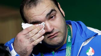 Iran weightlifter cries foul as Georgian takes Rio gold 