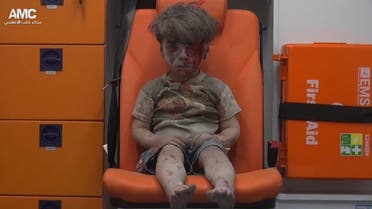 syrian boy ambulance aleppo AP AMC