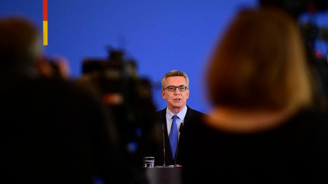 German Interior Minister De Maiziere said the full face veil 'does not belong in our cosmopolitan country'. (AFP)
