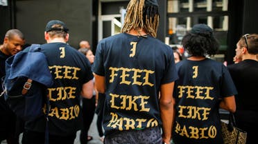 People wear "The life of Pablo" merchandise after visiting the pop up store featuring fashion by Kanye West in Manhattan, New York, US, August 19, 2016. (Reuters)