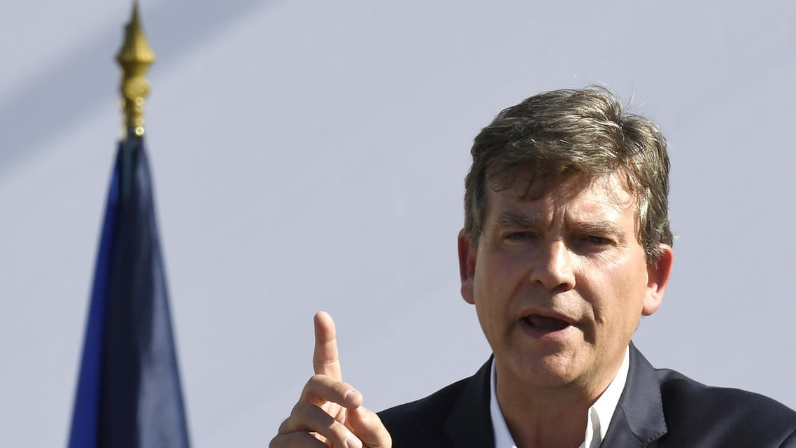 Former French Economy Minister Arnaud Montebourg gestures as he delivers a speech during the 44th annual meeting of the French socialist party (PS) "La fete de la Rose", on August 21, 2016 in Frangy-en-Bresse. Arnaud Montebourg announced his candidacy for the 2017 presidential elections, on August 21, 2016 in Frangy-en-Bresse (Saône-et-Loire). He also said that his presidential project will be "socialist but not only" and that was impossible for him to support French President France Hollande. AFP