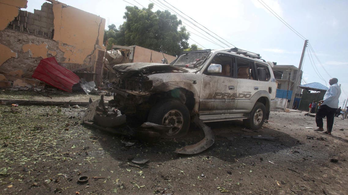The wreckage of a car destroyed during a suicide bombing is seen near the African Union's main peacekeeping base in Mogadishu, Somalia, July 26, 2016. REUTERS