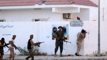 Forces loyal to Libya’s UN-backed Government of National Accord (GNA) hold a position near the central area known as District One on August 21, 2016 as they fight against ISIS holed up in Sirte. (AFP)