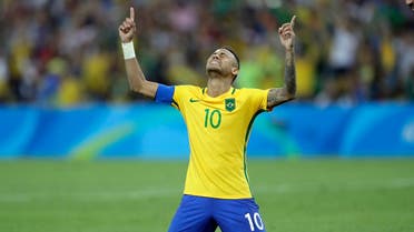 Brazil's Neymar cries as he kneels down to celebrate after scoring the decisive penalty kick during the final match of the men's Olympic football tournament between Brazil and Germany at the Maracana stadium in Rio de Janeiro, Brazil, Saturday Aug. 20, 2016. Brazil won the gold medal on a penalty shootout. (AP Photo/Andre Penner)