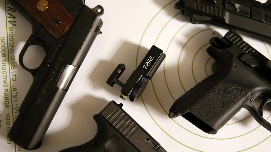Zore X, a mechanical dial that fits on to the gun chamber on semi-automatic guns, preventing unauthorized use of the gun, developed by Israeli compnay Zore, is displayed during a demonstration for Reuters in Jerusalem July 13, 2016. Picture taken July 13, 2016. REUTERS