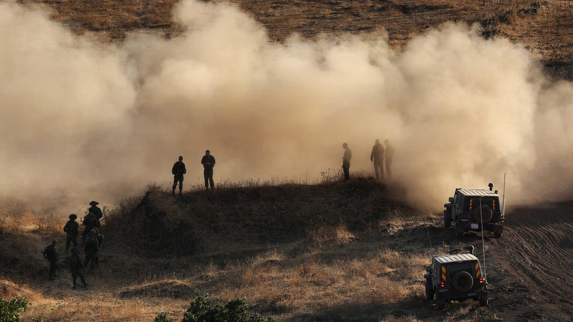 Israeli soldiers take part in a military exercise, which includes infantry, tanks and artillery units, in the northern part of the Israeli-annexed Golan Heights near the border with Syria on June 23, 2016. AFP