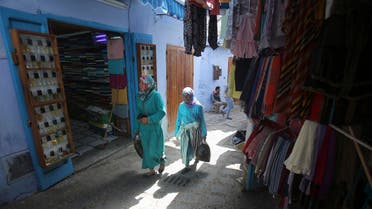 Residents walk in an alleyway in the old city of Chefchaouen, 153 miles from Rabat, in northwest Morocco. (File photo AP)