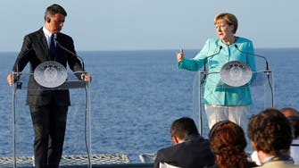 Merkel backs Italian PM over EU budget rules