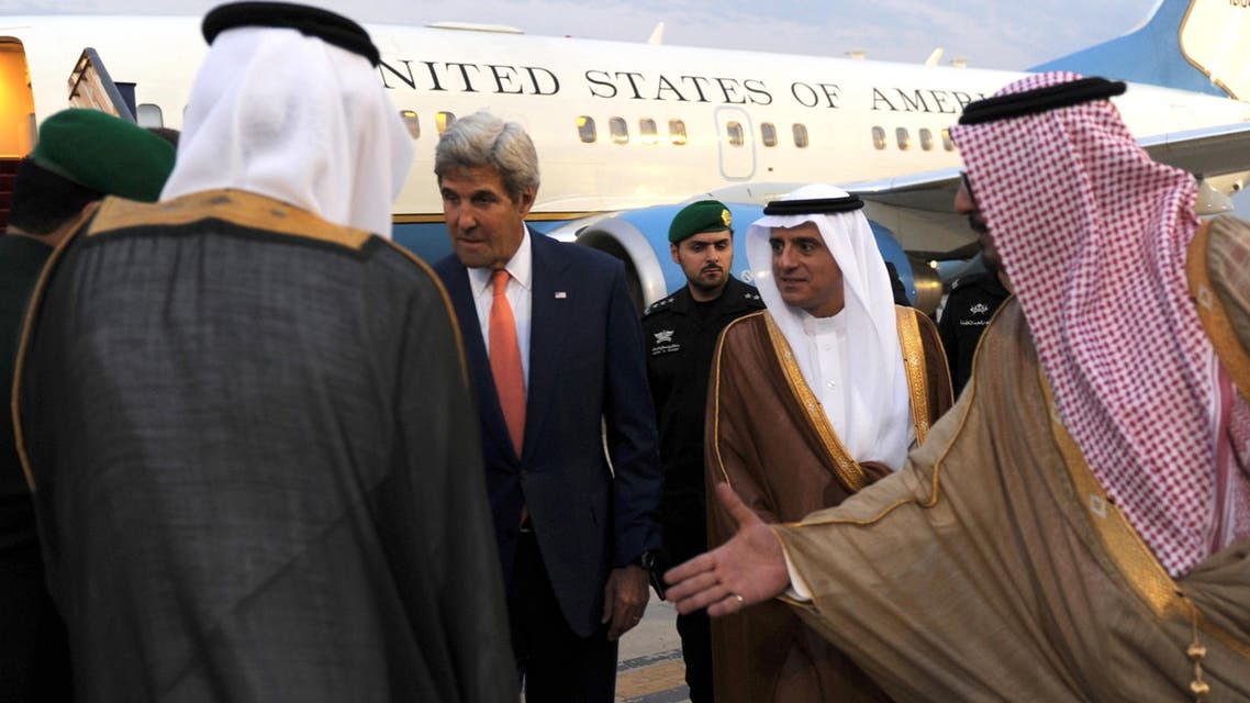 US Secretary of State John Kerry (C) is accompanied by Saudi Arabia’s Foreign Minister Adel al-Jubeir (C-R) as he is greeted upon his arrival at King Abdulaziz International Airport in Jeddah, on August 24, 2016. (AFP)