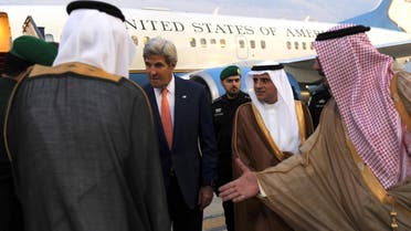 US Secretary of State John Kerry (C) is accompanied by Saudi Arabia’s Foreign Minister Adel al-Jubeir (C-R) as he is greeted upon his arrival at King Abdulaziz International Airport in Jeddah, on August 24, 2016. (AFP)
