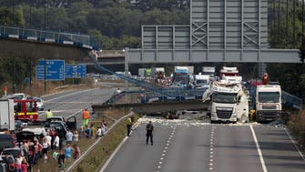 Traffic chaos as truck hits, collapses bridge on UK highway