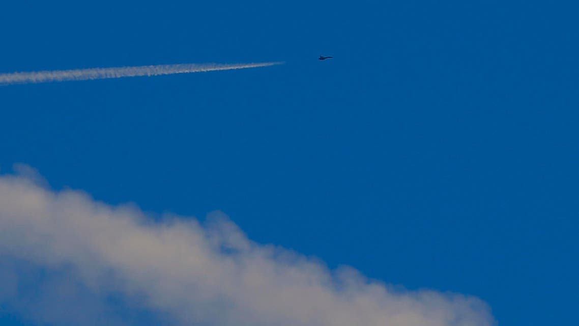 A fighter jet flies close to the border in Syrian air space as seen from Turkey's Oncupinar border crossing on the Turkish-Syrian border in Kilis, Turkey, February 9, 2016. REUTERS