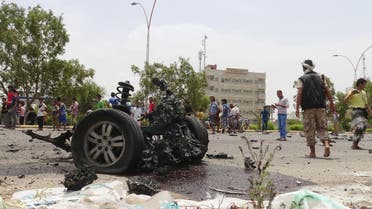 Members of the Southern Resistance militia gather at the site of a car bomb attack in the southern port city of Aden, Yemen July 31, 2016. REUTERS