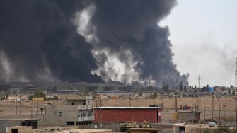 Iraq put out fire at four oil wells in freed town 