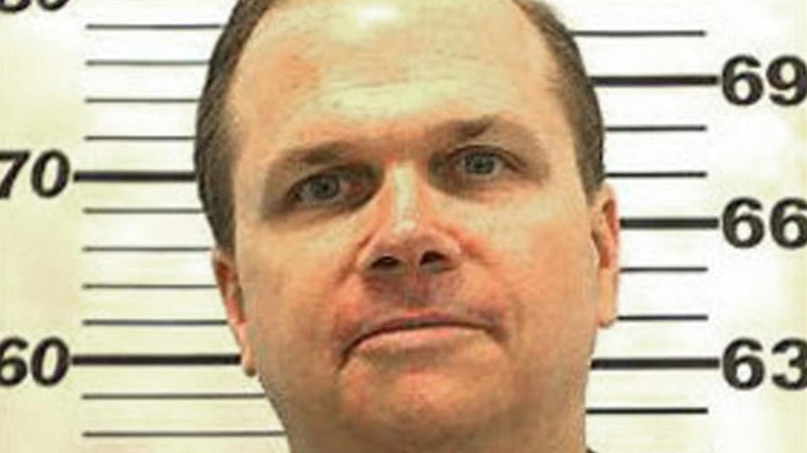 AFPThis undated handout mugshot provided by the New York State Department of Corrections shows inmate Mark David Chapman.
