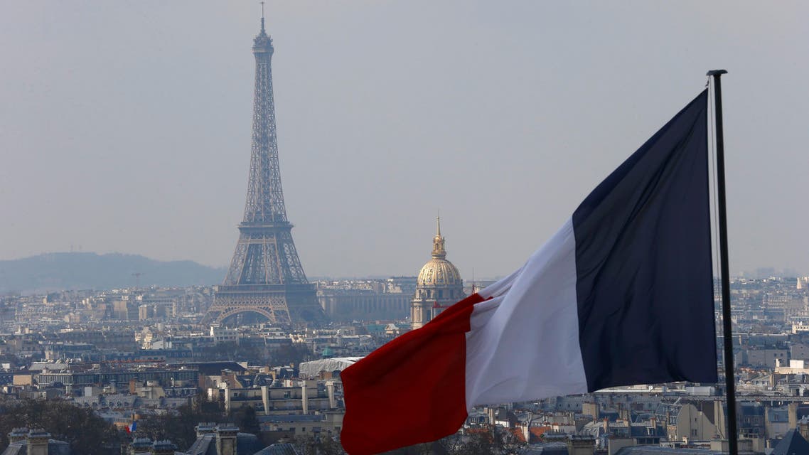 The French flag above the skyline of the French capital with the Eiffel Tower, The Invalides Dome and roof tops are seen from the colonnade of the Pantheon Dome in Paris, France, Friday, April 1, 2016. (Photo: AP)