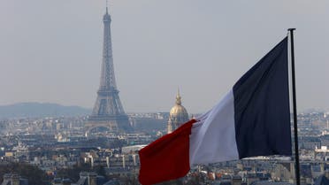 The French flag above the skyline of the French capital with the Eiffel Tower, The Invalides Dome and roof tops are seen from the colonnade of the Pantheon Dome in Paris, France, Friday, April 1, 2016. (Photo: AP)
