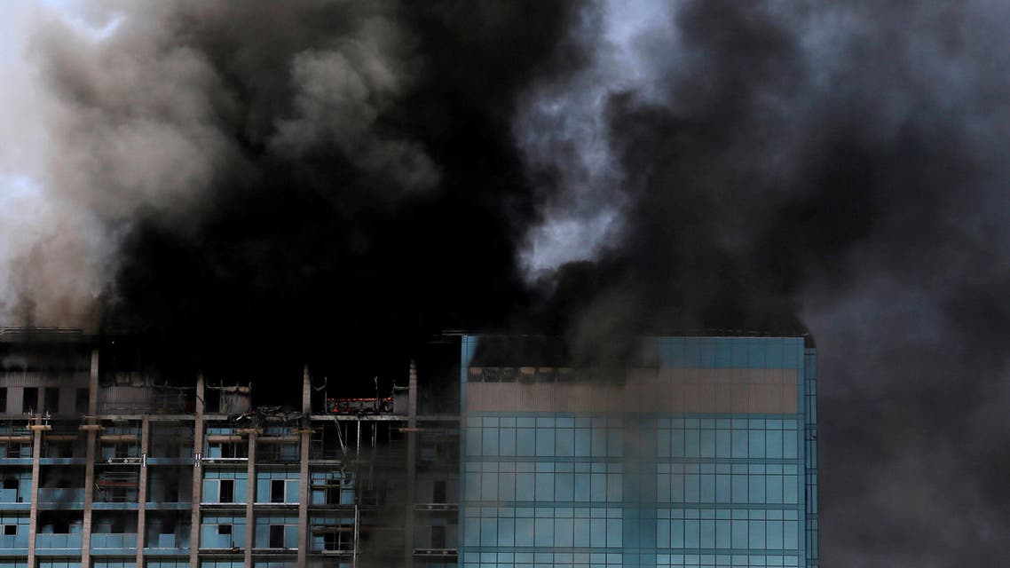 Smoke rises after a fire broke out in a building at Al Maryah Island in Abu Dhabi, UAE, August 30, 2016. (Photo: Reuters)