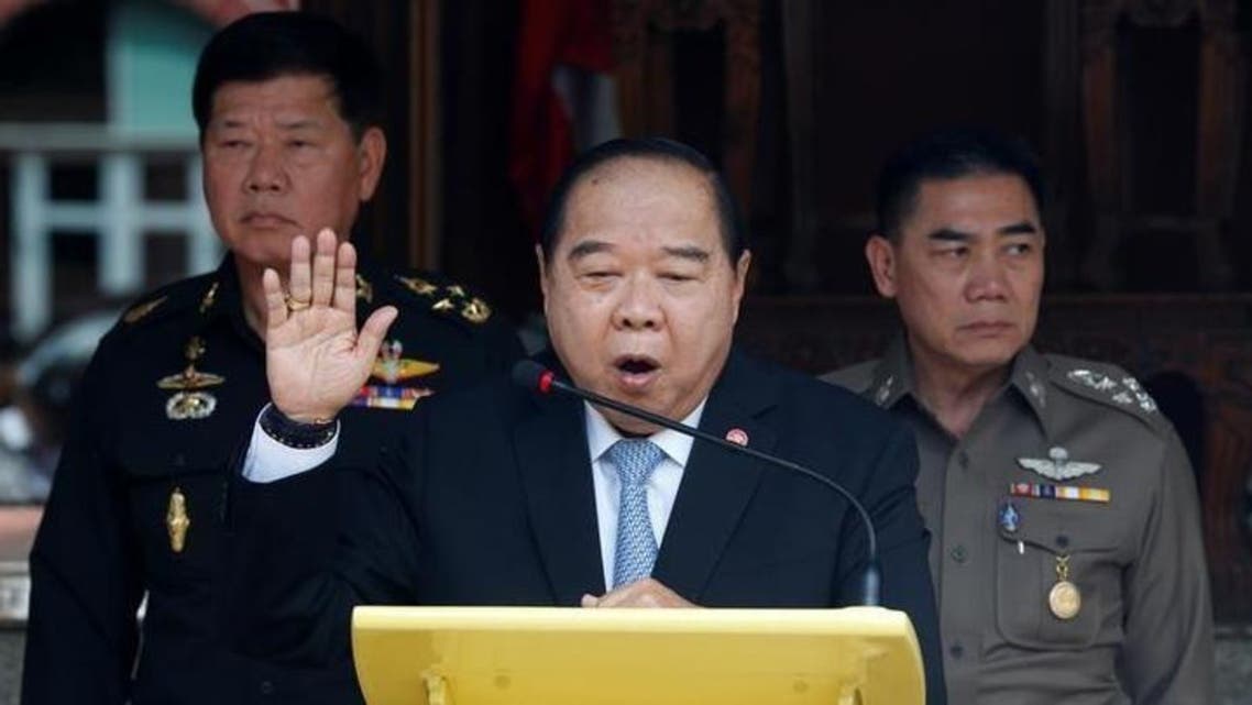Thailand's Deputy Prime Minister and Defence Minister Prawit Wongsuwan (C) speaks during a news conference after a National Security Council meeting as Thailand's national police chief Jakthip Chaijinda (R) and The Commander-in-Chief of the Royal Thai Army, Teerachai... REUTERS/Chaiwat Subprasom