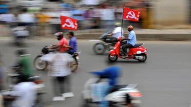 Workers from different trade unions ride motorcycles during a protest rally, as part of a nationwide strike, in Bengaluru, India September 2, 2016. (Reuters)