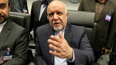 Iran's Minister of Petroleum Bijan Namdar Zangeneh, center, speaks to journalists prior to the start of a meeting of OPEC, at their headquarters in Vienna,on June 2,  2016. (AP)