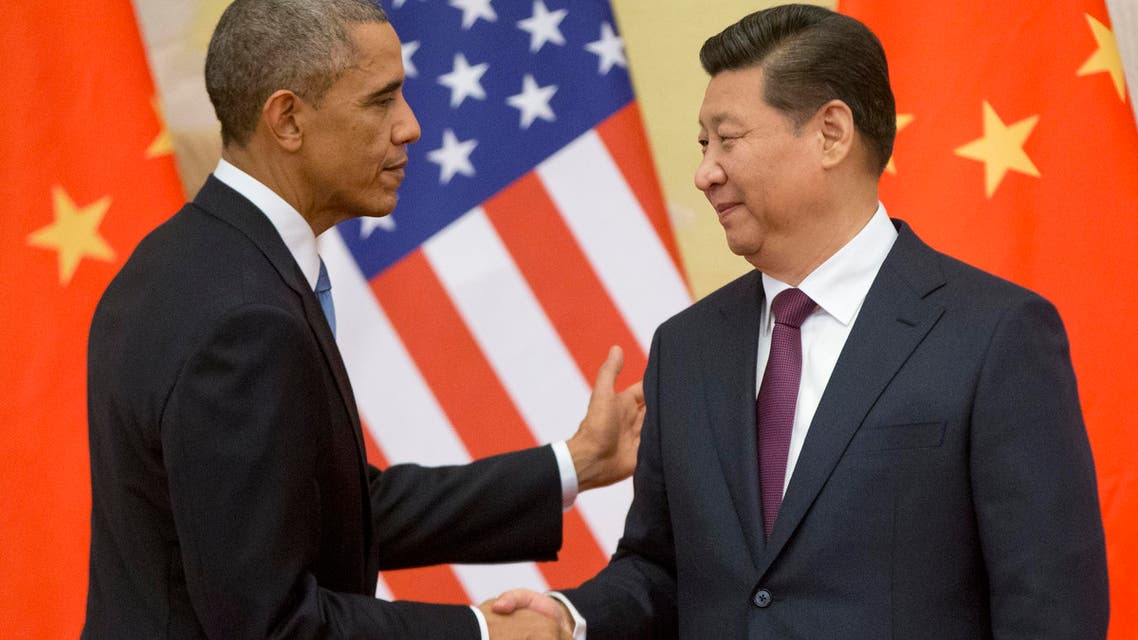 In this Nov. 12, 2014 file photo, President Barack Obama shakes hands with Chinese President Xi Jinping at the conclusion of their joint news conference at the Great Hall of the People in Beijing. (AP)