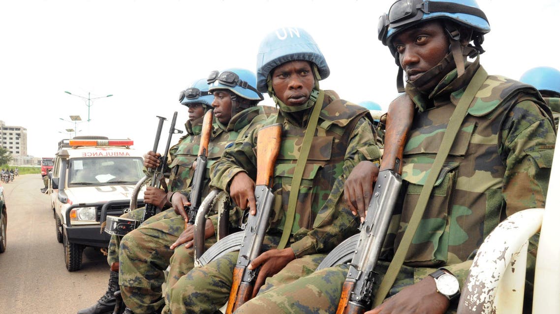 U.N. peacekeepers ride on their truck as they protect internally displaced people during a reallocation at the United Nations Mission in South Sudan (UNMISS) compound at the UN House in Jebel, in South Sudan's capital Juba, August 31, 2016. REUTERS