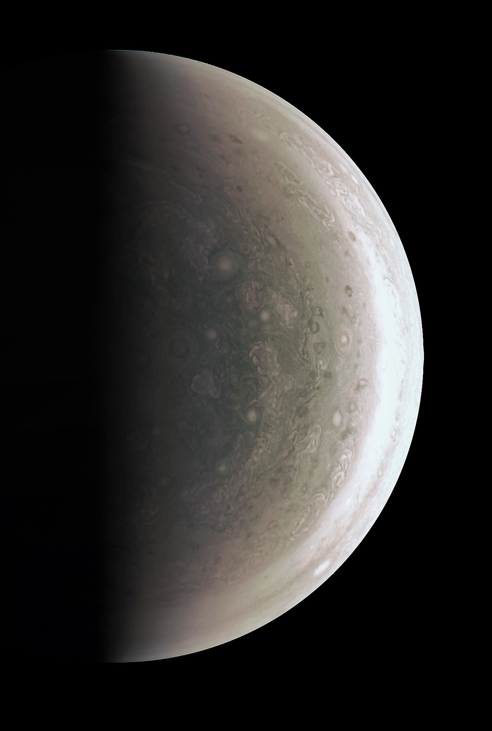 In this image obtained from NASA, Juno was about 48,000 miles (78,000 kilometers) above Jupiter's polar cloud tops when it captured this view, showing storms and weather unlike anywhere else in the solar system. The JunoCam instrument took the images to create this color view on August 27, when the spacecraft was about 48,000 miles (78,000 kilometers) above the polar cloud tops. HO / NASA / AFP