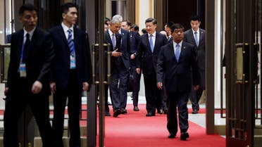 U.S. President Barack Obama and Chinese President Xi Jinping walk to the door to take a stroll outside at West Lake State Guest House in Hangzhou, in eastern China's Zhejiang province, September 3, 2016. REUTERS