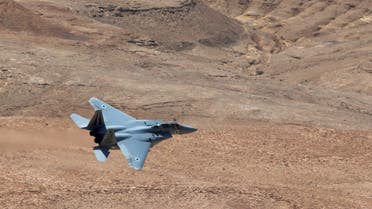 An Israeli air force F-15 fighter jet flys over Ramon Crater near Mizpe Ramon in southern Israel June 7, 2016. REUTERS