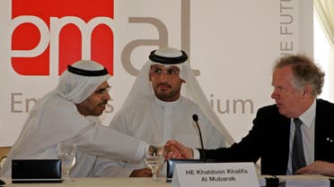 Khaldoon Khalifa Al Mubarak CEO and Managing Director of Mubadala Development (centre) with Abdullah Kalban, CEO of Dubai Aluminium, (left) and Canada's SNC Lavalin CEO, Jacques Lamarre, (right) on during the ground breaking ceremony  of Emirates Aluminium. (File photo: AP)