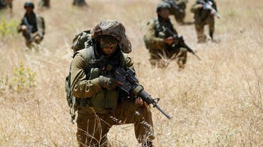 Israeli soldiers from the 605 Combat Engineering Corps battalion take part in a training session on the Israeli side of the border between Syria and the Israeli-occupied Golan Heights June 1, 2016. (Reuters)