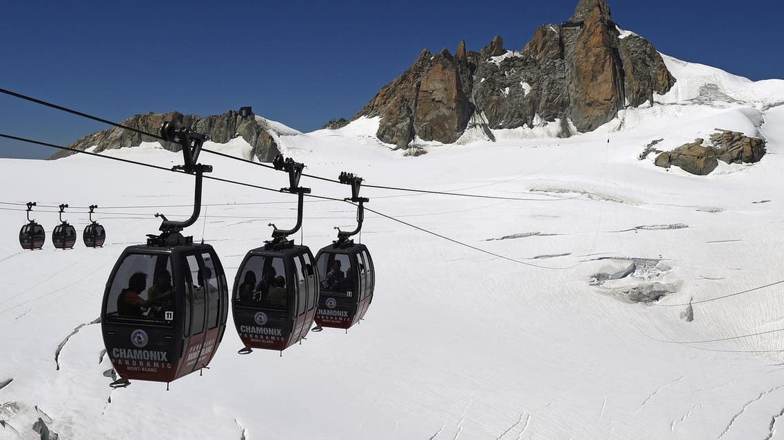 The cable cars, which carry four passengers each, offer panoramic views of Mont Blanc, which straddles the French-Italian border. (AFP)