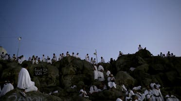 Muslim pilgrims pray on a rocky hill known as Mountain of Mercy, on the Plain of Arafat, during the annual hajj pilgrimage. (AP)