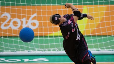 In this photo provided by the IOC, Asya Miller, of the United States, takes a shot in a Goalball women's preliminary Group C match against Brazil during the Paralympic Games at the Future Arena, in Rio de Janeiro, Brazil, Thursday, Sept. 8, 2016. AP