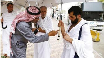 Hajj pilgrims use Smart Umbrella