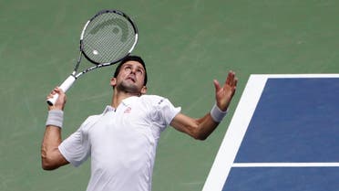 Novak Djokovic, of Serbia, returns a shot to Gael Monfils, of France, during the semifinals of the U.S. Open tennis tournament, Friday, Sept. 9, 2016, in New York. (AP)
