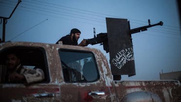 A member of the Islamist Syrian opposition group Ahrar al-Sham fires against a position of the Committees for the Protection of the Kurdish People (YPG). (File photo: AFP)