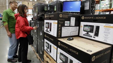 Shoppers look at Hewlett-Packard Company printers, monitors and computers at Costco in Mountain View, California. (AP)
