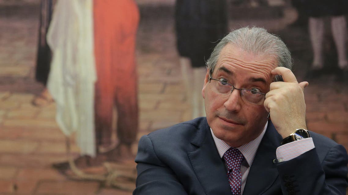 Brazil's former President of the Chamber of Deputies Eduardo Cunha listens to a question during the presentation of his defense in the Chamber of Deputies, in Brasilia, Brazil, Tuesday, July 12, 2016. (AP)
