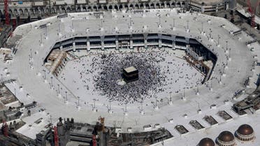 An aerial view shows of Muslim pilgrims from all around the world circling around the Kaaba at the Grand Mosque, in the Saudi city of Makkah  (Photo: Ahmad Gharabli/AFP)