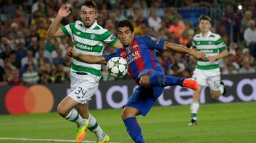 Barcelona's Luis Suarez shoots to score his side's 6th goal during a Champions League, Group C soccer match between Barcelona and Celtic, at the Camp Nou stadium in Barcelona, Spain, Tuesday, Sept. 13, 2016. (AP 